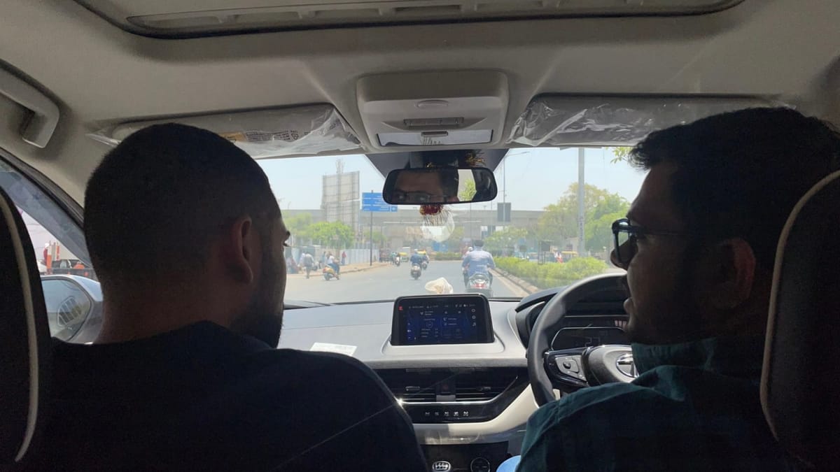 Alexander Clemencia with Deep Patel in the car